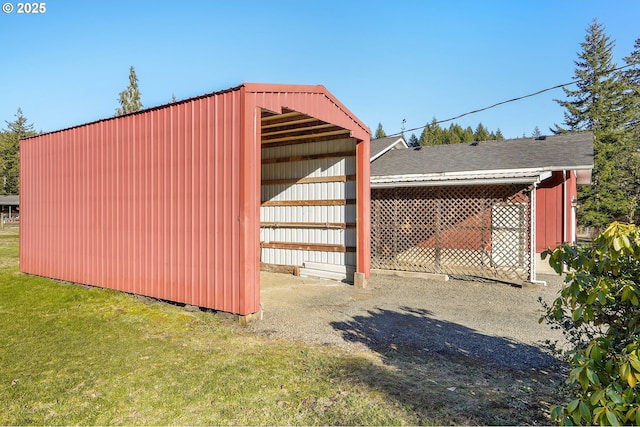 view of outdoor structure featuring a yard