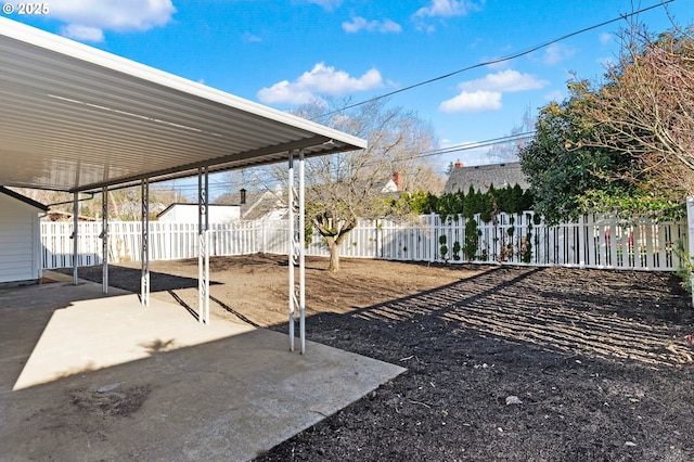 view of yard featuring a patio and fence