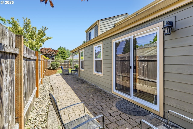 319 NE Hyde Cir, Hillsboro, OR 97124 - fenced backyard featuring a patio