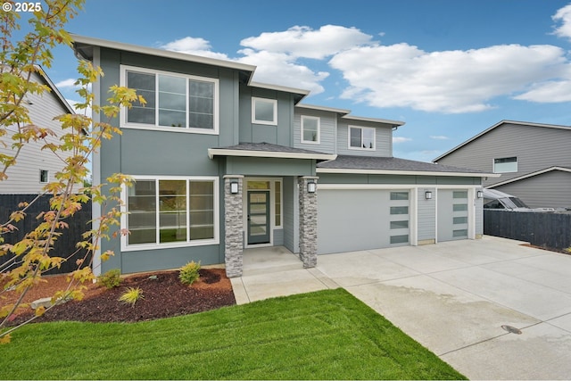 310 W 20th Way, La Center, WA 98629 - prairie-style home with concrete driveway and a garage