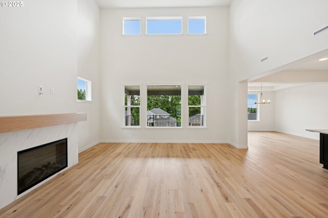 310 W 20th Way, La Center, WA 98629 - full bathroom with vanity, marble finish floors, a spacious closet, and a shower