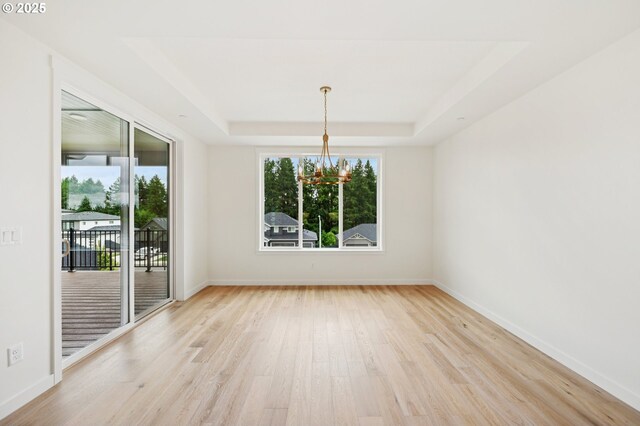 310 W 20th Way, La Center, WA 98629 - kitchen featuring appliances with stainless steel finishes, a sink, dark cabinets, a textured ceiling, and open floor plan