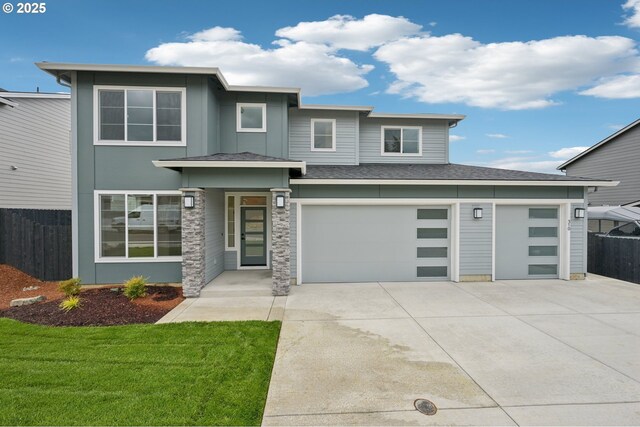 310 W 20th Way, La Center, WA 98629 - unfurnished living room with a high end fireplace and stairway