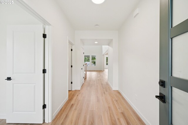 310 W 20th Way, La Center, WA 98629 - unfurnished living room featuring a high end fireplace and stairway