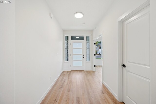 310 W 20th Way, La Center, WA 98629 - unfurnished room with healthy amount of natural light and light wood-type flooring
