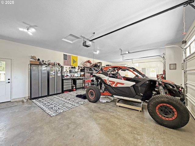 7205 Edge Cliff Dr, Brookings, OR 97415 - garage featuring a garage door opener
