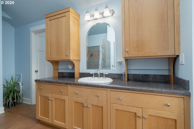 bathroom with vanity and tile patterned flooring