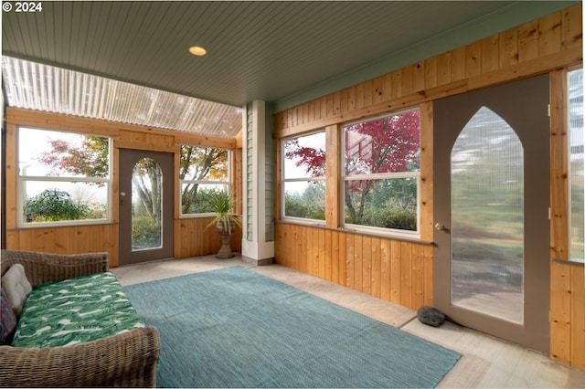 sunroom featuring wooden ceiling