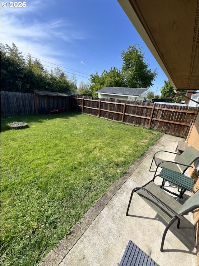 815 Nyssa St, Junction City, OR 97448 - view of yard featuring a patio area and a fenced backyard