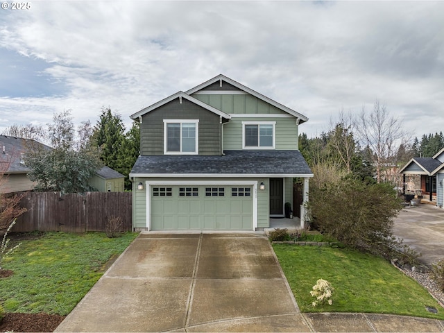 view of front of home with fence, a garage, concrete driveway, a front yard, and board and batten siding