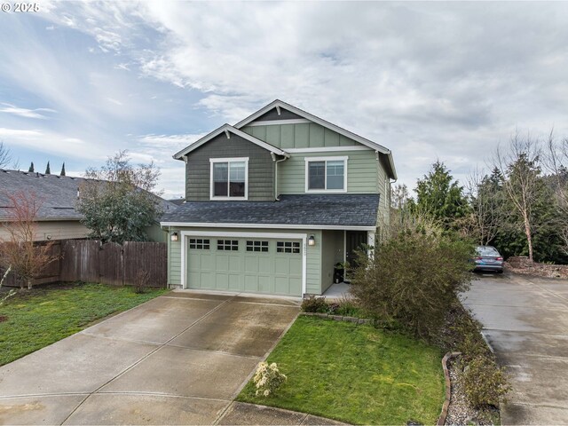 view of front facade with fence, an attached garage, board and batten siding, driveway, and a shingled roof