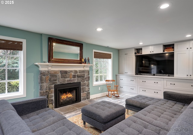 living room featuring a fireplace