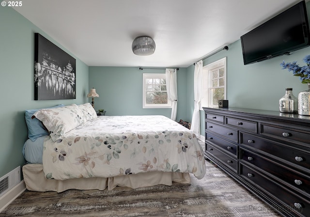 bedroom featuring hardwood / wood-style floors