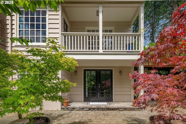 1665 SW Highland Pkwy, Portland, OR 97221 - property entrance featuring a balcony and french doors