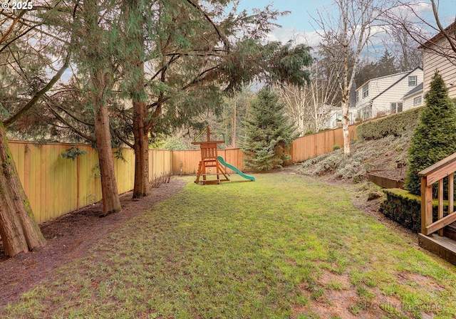 view of yard featuring a playground