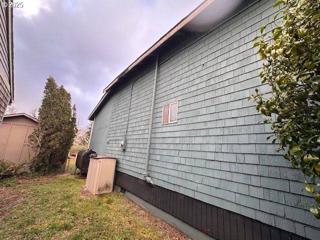 view of home's exterior featuring a lawn