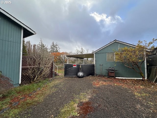 view of yard with a carport