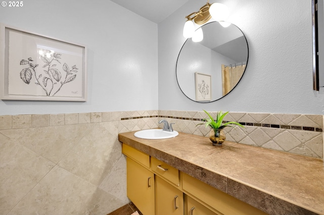 bathroom with toilet, a wainscoted wall, shower / bathtub combination with curtain, and tile walls