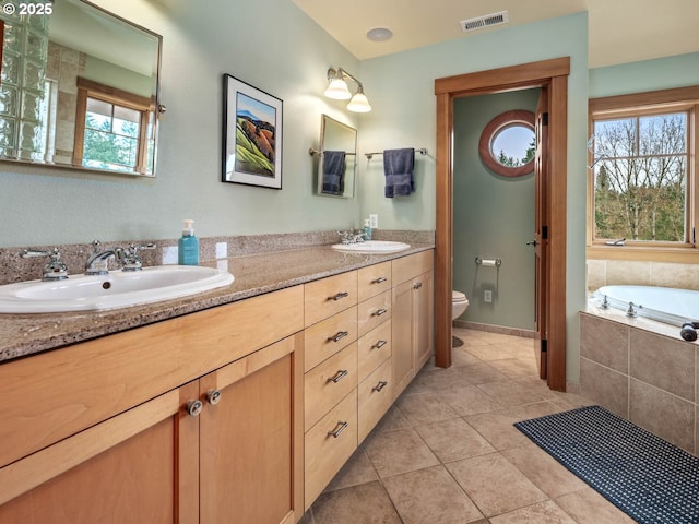 13615 NW Mason Hill Rd, North Plains, OR 97133 - full bath featuring toilet, plenty of natural light, tile patterned flooring, and double vanity