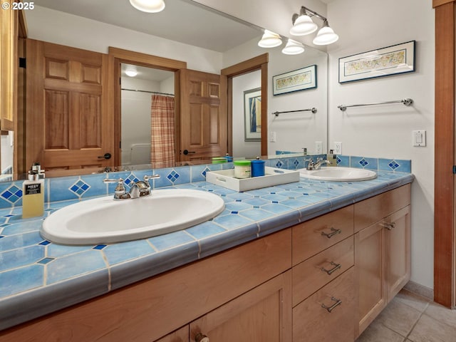 13615 NW Mason Hill Rd, North Plains, OR 97133 - full bath featuring double vanity, tile patterned flooring, and curtained shower