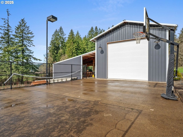 13615 NW Mason Hill Rd, North Plains, OR 97133 - garage featuring a detached garage, driveway, and fence