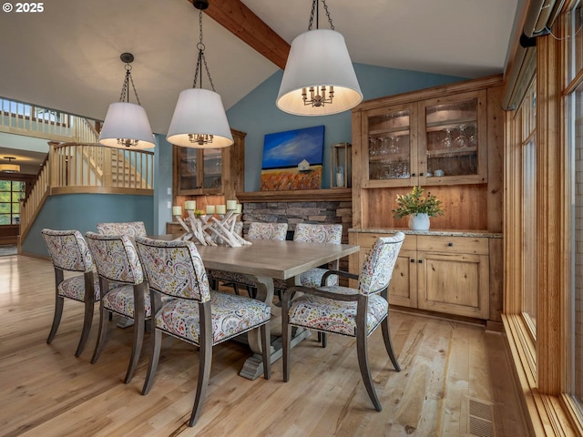 13615 NW Mason Hill Rd, North Plains, OR 97133 - dining area with light wood-style floors and stairway