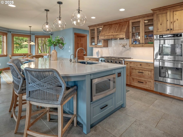 13615 NW Mason Hill Rd, North Plains, OR 97133 - kitchen with appliances with stainless steel finishes, a sink, a warming drawer, premium range hood, and recessed lighting