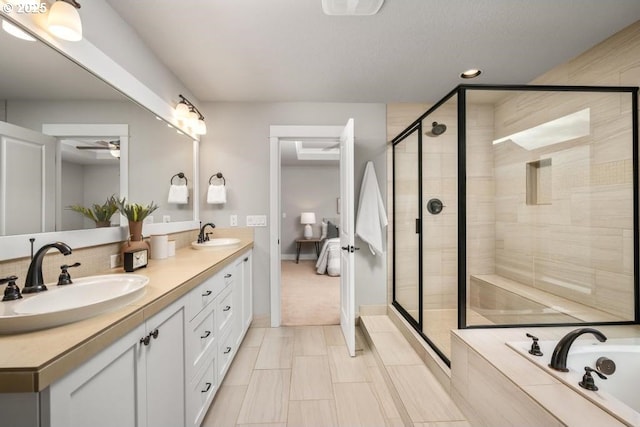 bathroom featuring vanity, shower with separate bathtub, ceiling fan, and decorative backsplash