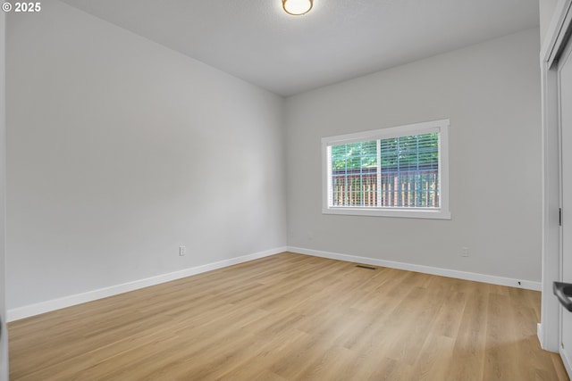 1111 SW Linneman Ave, Gresham, OR 97080 - unfurnished room with baseboards and light wood-style floors