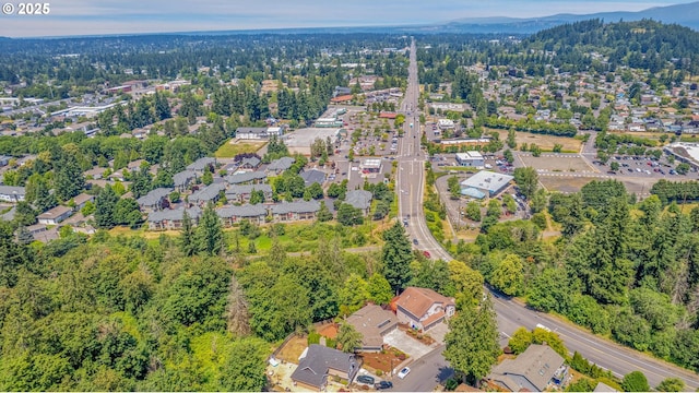1111 SW Linneman Ave, Gresham, OR 97080 - aerial view of property and surrounding area with a heavily wooded area