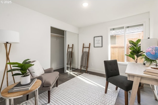 office space with dark hardwood / wood-style floors