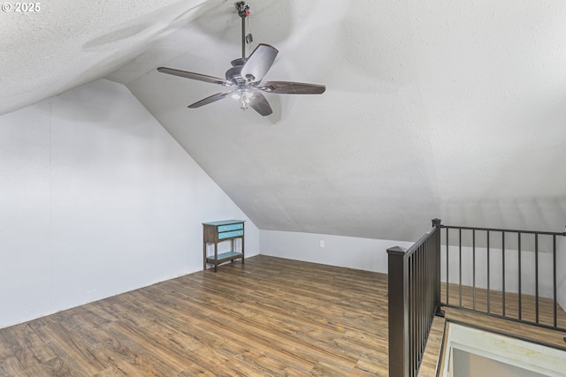 11868 N Jantzen Dr, Portland, OR 97217 - bonus room featuring wood finished floors, vaulted ceiling, a textured ceiling, and ceiling fan