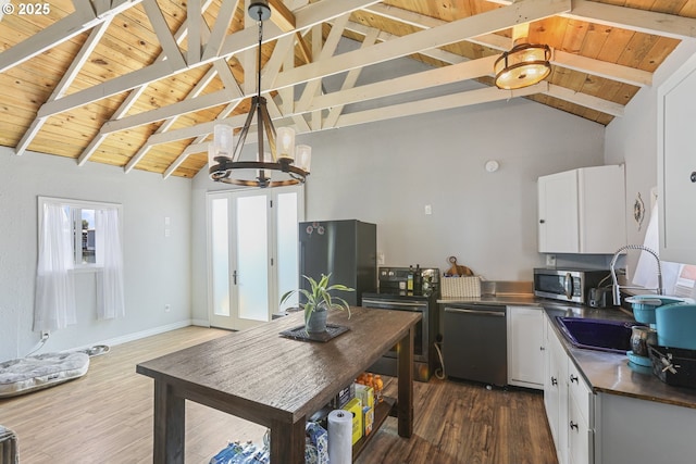 11868 N Jantzen Dr, Portland, OR 97217 - kitchen with appliances with stainless steel finishes, wooden ceiling, dark wood-style flooring, a chandelier, and a sink