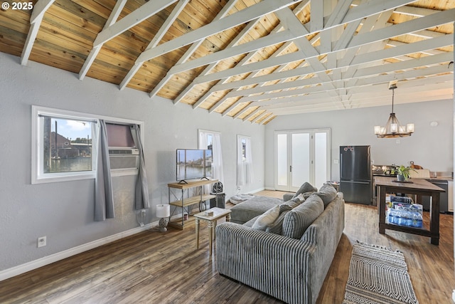 11868 N Jantzen Dr, Portland, OR 97217 - living area with baseboards, plenty of natural light, wood finished floors, and wooden ceiling