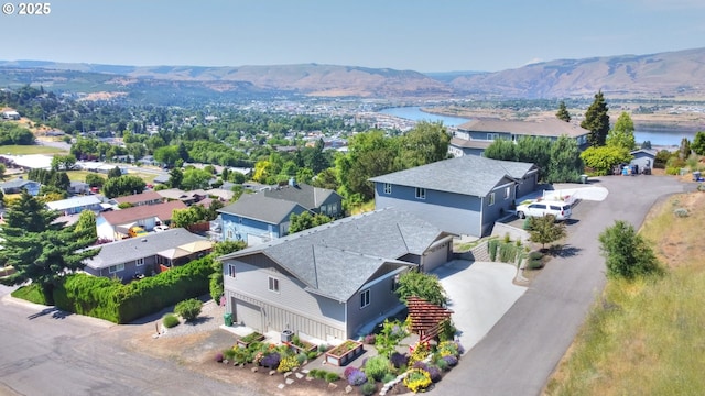 1637 E 21st St, The Dalles, OR 97058 - aerial perspective of suburban area with a water and mountain view