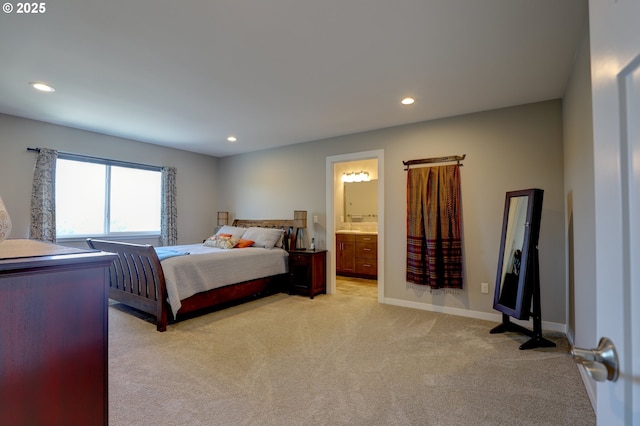 1637 E 21st St, The Dalles, OR 97058 - bedroom featuring light colored carpet, recessed lighting, connected bathroom, and baseboards