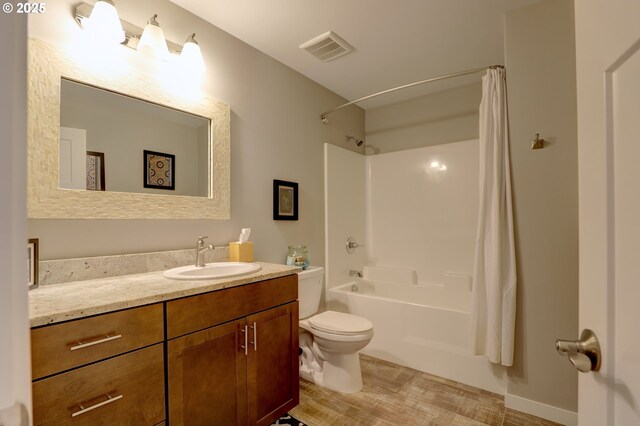 1637 E 21st St, The Dalles, OR 97058 - full bath with vanity, toilet, and shower / bath combination with curtain