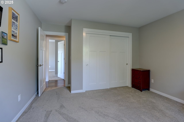 1637 E 21st St, The Dalles, OR 97058 - unfurnished bedroom with carpet flooring, baseboards, and a closet