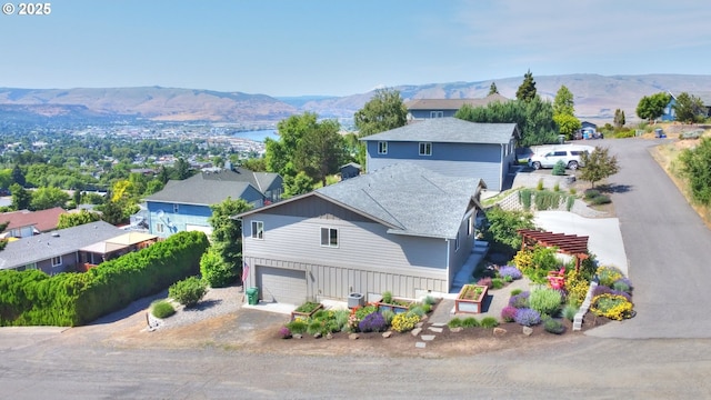 1637 E 21st St, The Dalles, OR 97058 - aerial view of property and surrounding area featuring a mountainous background