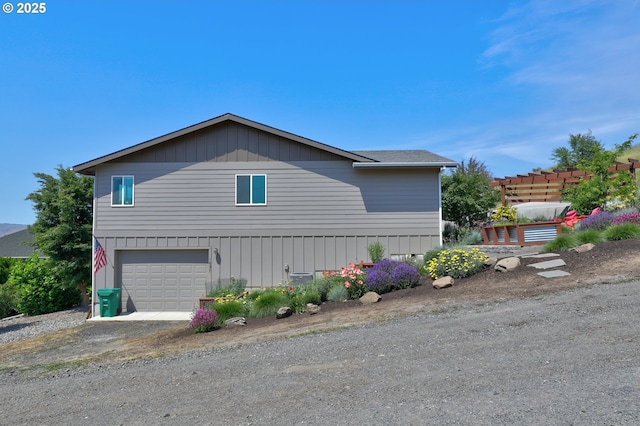 1637 E 21st St, The Dalles, OR 97058 - view of side of property with a garage and driveway