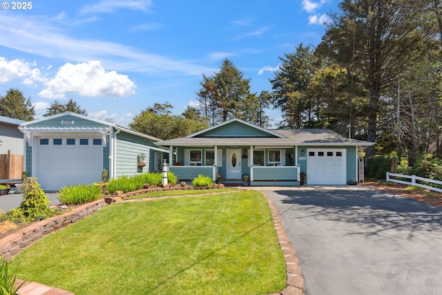 ranch-style house featuring an attached garage, asphalt driveway, and a porch