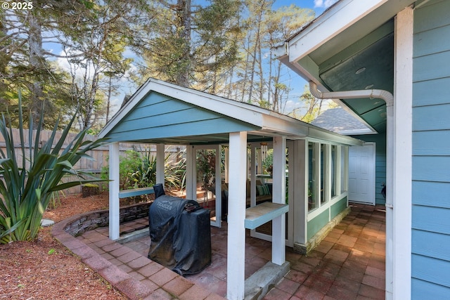 view of patio with fence