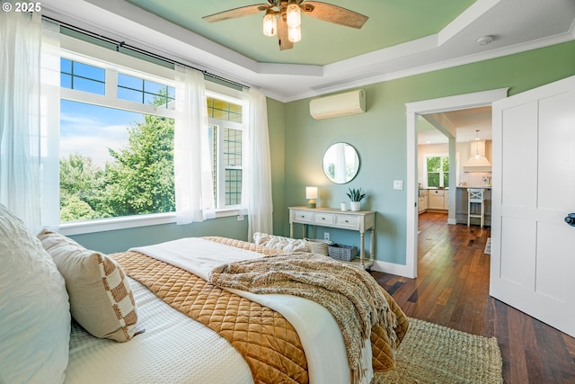 18266 S Holly Ln, Oregon City, OR 97045 - bedroom with a wall mounted AC, hardwood / wood-style flooring, crown molding, a tray ceiling, and ceiling fan