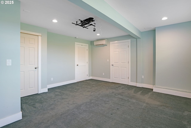 18266 S Holly Ln, Oregon City, OR 97045 - below grade area featuring dark colored carpet, a wall mounted AC, recessed lighting, and baseboards
