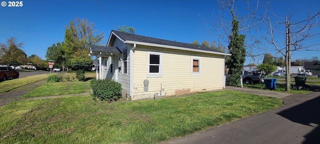 323 Academy St, Salem, OR 97301 - view of home's exterior with a lawn and crawl space