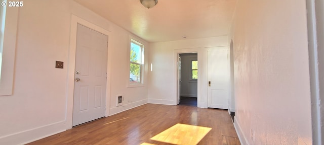 323 Academy St, Salem, OR 97301 - entryway with wood finished floors and baseboards