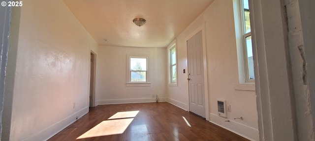 323 Academy St, Salem, OR 97301 - foyer entrance featuring dark wood finished floors and baseboards
