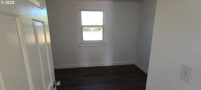 323 Academy St, Salem, OR 97301 - spare room featuring dark wood-style floors, healthy amount of natural light, and baseboards