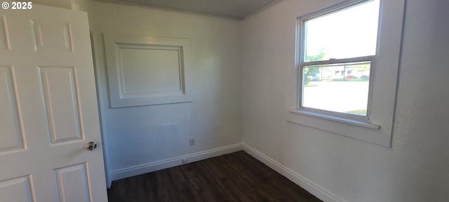 323 Academy St, Salem, OR 97301 - spare room featuring dark wood-style flooring, baseboards, and crown molding