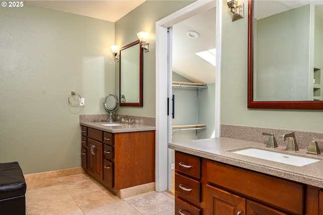 11782 SE 108th Ave, Happy Valley, OR 97086 - full bath featuring two vanities, lofted ceiling, and tile patterned floors